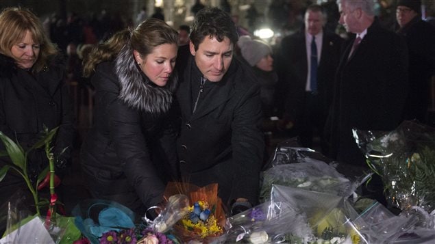 Prime Minister Justin Trudeau and his wife offered flowers at a vigil in Quebec City.
