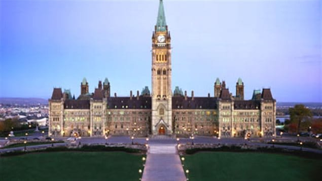 The Centre Block of Parliament as it appears today with the much higher central Victory and Peace tower. with it’s central clock and a 53-bell carillon played every weekday.