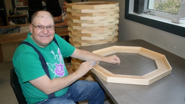 Woodworkers at Blue Sky Opportunities have been making and selling crokinole boards since the 1980s in Altona, Man. 