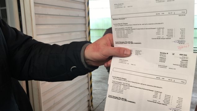 Jamie Diniro owns a cucumber greenhouse and says his bill has more than doubled since January. he also says the new bills are unclear as to what they’re paying for.