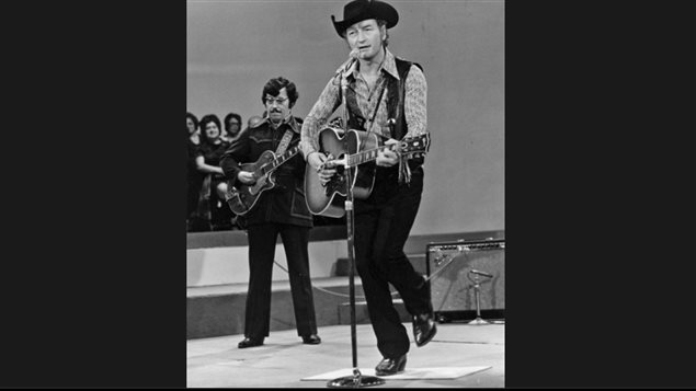 Stompin’ Tom during his 1974-75 TV series on CBC -TV, shown here with his foot captured in mid-stomp