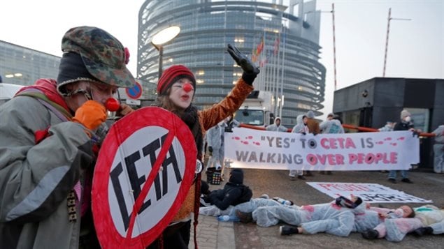 Demonstrators protest the Canada-EU trade agreement in Strasbourg, France, the seat of the European Parliament.