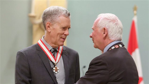 Stuart McLean (left) was presented with the Officer of the Order of Canada medal on September 28, 2012.