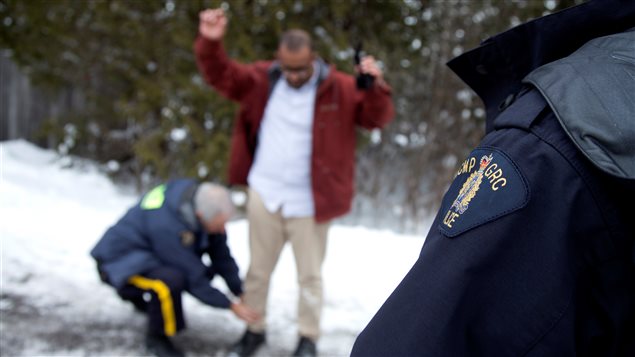 The man had his arms up as he crossed the border. The RCMP officer said he didn’t have to do that here, he could put his arms down. 