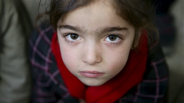 Gharam, 5, an orphan, attends a gathering organized by Damascus Lovers, a group that helps with social support for orphans, in Harasta, in the eastern Damascus suburb of Ghouta, Syria January 30, 2016.