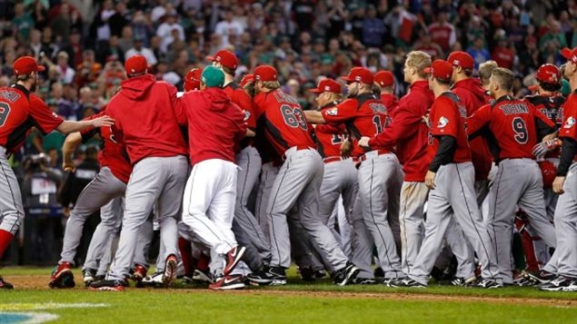 Maybe it's in our DNA. Canadian players brought some of the moves learned at the hockey rinks of their youth to their 2013 World Baseball Classic game against Mexico, delivering a twist to that old line about going to a fight, only to see a hockey game break out.