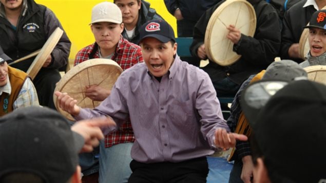 Opposing team captains use elaborate hand gestures to call the play. March 2012, Behchoko, N.W.T. (Levon Sevunts/Eye on the Arctic)