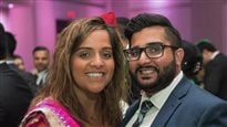 Manpreet Kooner, pictured with her fiancé, was born in Canada and holds a Canadian passport. She claims she was turned away at the U.S. border and told she needed an immigrant visa. 