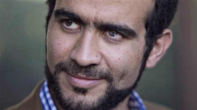 Omar Khadr watched his lawyer explain his bail conditions on September 11, 2015 in the western city of Edmonton.