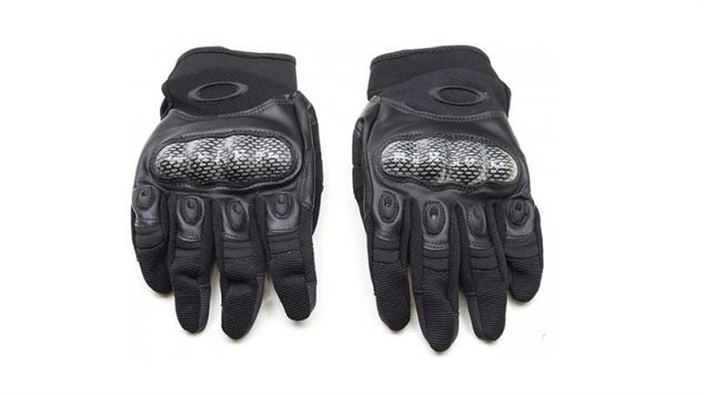 *like brass knuckles*. Oakley tactical gloves with hardened knuckle area of the typ worn in the Abdi case. If not issued by their police force, officers will sometimes buy them for themselves online.