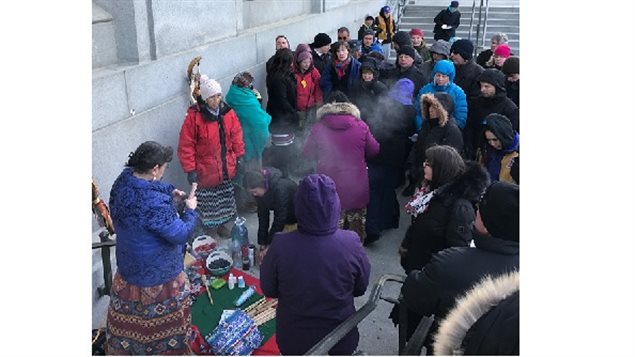 First Nations members and supporters of their Peel plan gather for a traditional water ceremony this morning at the Supreme Court of Canada where their case against the Yukon Government and the need for consultation with First Nations over land use on their land was heard today