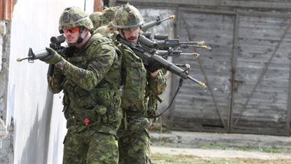 Canadian troops take part in a joint exercise with Polish troops not far from Ukraine's western border last year. About 450 Canadian troops will be deployed as part of a NATO force in Latvia in June. 