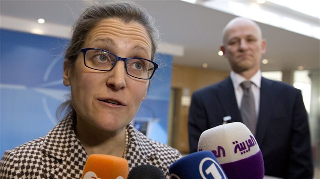 Canadian Foreign Minister Chrystia Freeland speaks with the media as she arrives for a meeting of NATO foreign ministers at NATO headquarters in Brussels on Friday, March 31, 2017. 