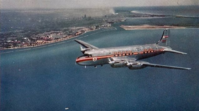  A Canadian salesman’s flight in 1955 inspired the new concept of *disaster* films. Here, a Trans Canada Airlines (TCA) postcard cicra 1950’s showing a Canadair North Star over Toronto. The North Star was a Canadian upgrade to the DC-4 featuring more powerful  (but noisier) Rolls Royce engines