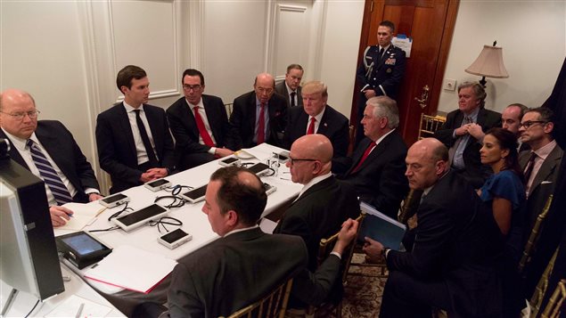 U.S. President Donald Trump is shown in an official White House handout image meeting with his National Security team and being briefed by Chairman of the Joint Chiefs of Staff General Joseph Dunford via secure video teleconference after a missile strike on Syria while inside the Sensitive Compartmented Information Facility at his Mar-a-Lago resort in West Palm Beach, Florida, U.S. April 6, 2017.