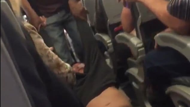 Video of a man being forcibly removed from a United Airlines flight was shot by fellow passengers and posted online.