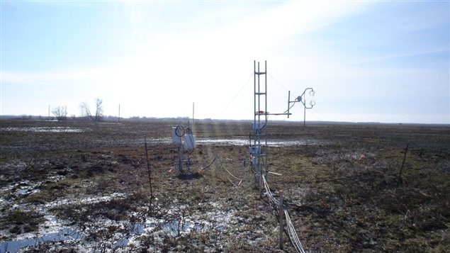 ’Monitoring equipment over thawing field at Glenlea, University of Manitoba research station’.