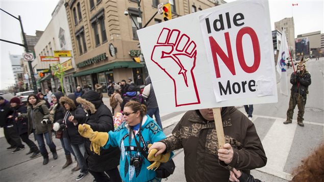 Protesters with the indigenous Idle No More movement blocked an intersection in London, Ontario on March 21, 2013.