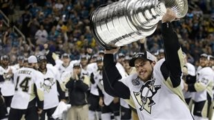 Penguins captain and Canadian Olympic hero Sidney Crosby hoists the Stanley Cup after the Penguins defeated the San Jose Sharks in a deciding Game 6 by a score of 3-1 last spring. Not a single Canadian team made made the playoffs last season.