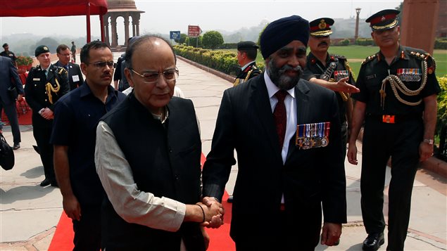 Canada’s Defence Minister Harjit Sajjan shakes hands with his Indian counterpart Arun Jaitley (L) after his ceremonial reception in New Delhi, India April 18, 2017