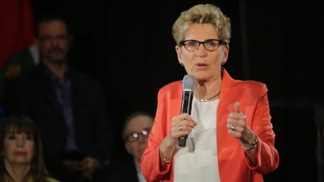 Ontario Premier Kathleen Wynne announced a pilot project to help people pay for their basic needs.
