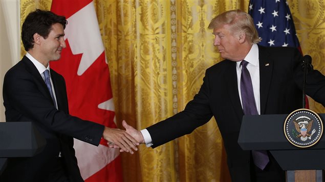 Canadian Prime Minister Justin Trudeau (L) shakes hands with U.S. President Donald Trump (R) at the conclusion of their joint news conference at the White House in Washington, U.S., February 13, 2017.