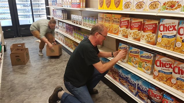 Professor von Massow helping to stock shelves. He says even though the *lab* isn’t operational yet, the wider research community is already expressing interest in the many possibililties it present