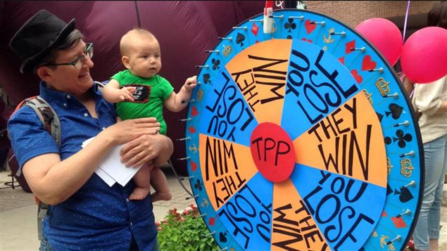 *Wheel of trade Misfortune* seen at an anti- TPP protest in Toronto June 2016.