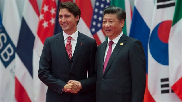 Canadian Prime Minister Justin Trudeau is greeted by Chinese President Xi Jinping at the G20 Leaders Summit in Hangzhou, China on Sept. 4, 2016. Polls show the majority of Canadians are wary of the implications of a free trade deal with China