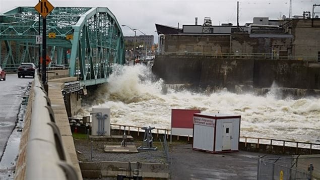 Surging water breaches the Chaudière Bridge SUnday, May , 2017 that connects Gatineau to as floodwaters continue to rise. 