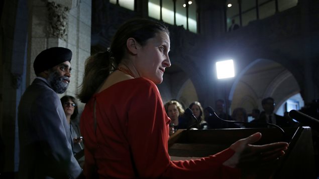 Canada’s Foreign Minister Chrystia Freeland speaks during a news conference with Defence Minister Harjit Sajjan (L) on Parliament Hill in Ottawa, Ontario, Canada, March 6, 2017.