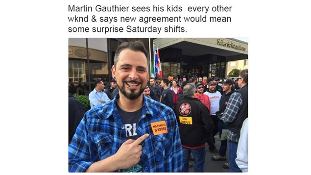 Worker Martin Gauthier points to a strike sticker on his chest which reads *Ma famille d’abord* (My family comes first)