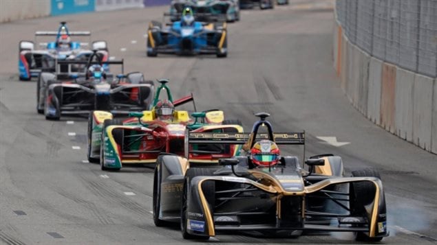 Race cars compete during the Formula E Hong Kong ePrix auto race, Sunday, Oct. 9, 2016. 