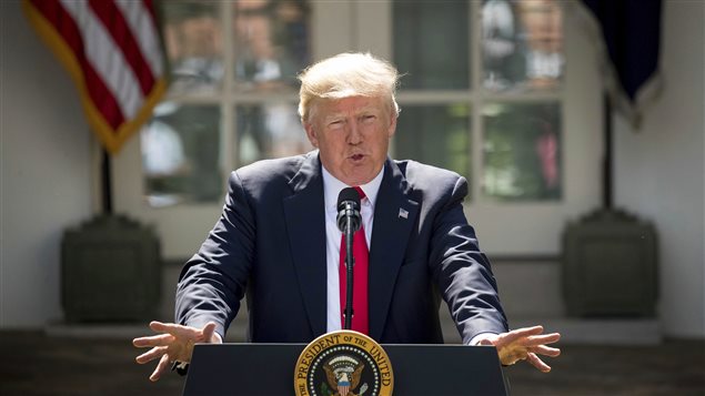 President Donald Trump speaks about the U.S. role in the Paris climate change accord, Thursday, June 1, 2017, in the Rose Garden of the White House in Washington. 