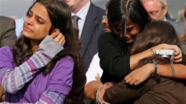 Relatives of Air India victim Anjani Kumar Sinha, from left, Geetika, Aarushi and Nivedita Srivastava, react to a June 23 service at a memorial in Ahakista, Ireland, to mark the 25th anniversary of the crash. A minute’s silence was broken by chanting from the families at 8:13 a.m. — the moment a bomb exploded in a suitcase on Air India Flight 182, killing all 329 passengers and crew on board. 