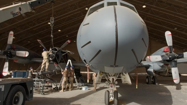 Servicing a Canadian CP-140 patrol plane, in 2015. Unionised defence workers say the new government policy will give private firms unprecedented access to DND operations. They fear the naval contract is just the start, and with proprietary new technology potentially keep them from being able to service or repair some equipment which could threaten operations, and contractors could charge higher fees being the only one to service equipment.