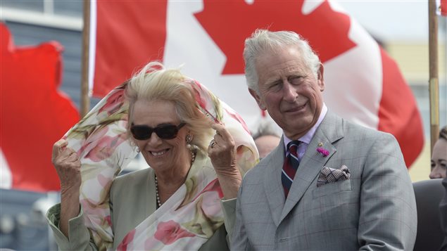 Prince Charles and Camilla, the Duchess of Cornwall, look on after arriving in Iqaluit, Nunavut, Thursday, June 29, 2017.