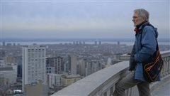 Director John Walker at Mount Royal lookout in a scene from the film Quebec: My Country/Mon Pays