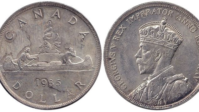 The original one-dollar coin was created in 1935 to celebrate the 25 years of King George V’s reign. The voyageur was the most commonly minted reverse image though special editions were minted over the decades. Originally mostly silver, the silver content was reduced over the years until the coin was replaced by the ’new’ gold-coloured coin in 1987. Originally to use the ’voyageur’ design, the dies were strangely ’lost’ in transit leading to the loon image and name ’loonie’ 