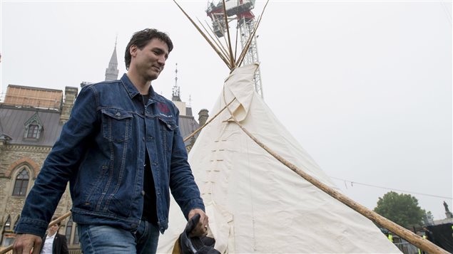 Prime Minister Justin Trudeau leaves a teepee on Parliament Hill in Ottawa on Friday, June 30, 2017. 