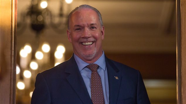 British Columbia Premier-designate, NDP Leader John Horgan emerges from Government House after meeting with Lt-Gov. Judith Guichon in Victoria, B.C., on Thursday, June 29, 2017. 