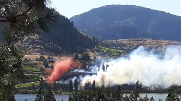 The fire in Kaleden broke out amid unseasonably warm temperatures.