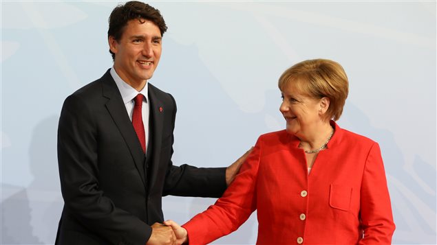German Chancellor Angela Merkel welcomes Canada’s Prime Minister Justin Trudeau to the opening day of the G20 leaders summit in Hamburg, Germany, July 7, 2017.