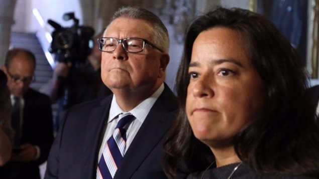 Minister of Justice Jody Wilson-Raybould stands with Public Safety Minister Ralph Goodale. The two senior cabinet ministers announced an apology and settlement with Omar Khadr on July 7, 2017