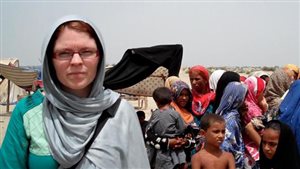 2010: Canadian Lindsay Gladding shown helping with disaster relief efforts in Pakistan’s Punjab province. 