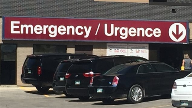 The former president’s motorcade is seen parked outside of St. Boniface General Hospital in Winnipeg.