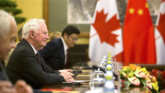 Governor General of Canada David Johnston, second from left, sits during a meeting with Chinese President Xi Jinping at the Diaoyutai State Guesthouse in Beijing, Thursday, July 13, 2017.