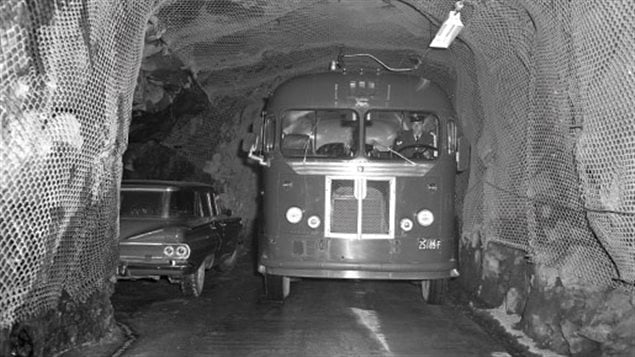 The tunnels only allowed one vehicle at a time, so any car would have to pull into a cubby hole to allow the bus to pass.