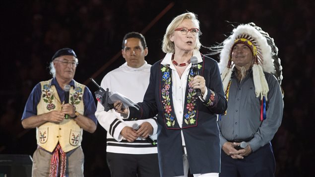 Canada’s Minister of Indigenous and Northern Affairs Carolyn Bennett speaks as President Clement Chartier of the Metis Nation, left to right, President Natan Obed of the Inuit Tapiriit Kanatami and National Chief of the Assembly of First Nations Perry Bellegarde look on during the opening ceremony of the 2017 North American Indigenous Games, in Toronto on Sunday, July 16, 2017.