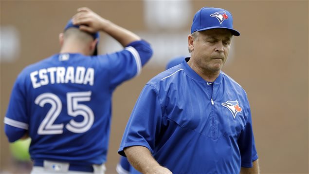 Blue Jays manager John Gibbons, whose job could be on the line at season's end, walks to the dugout after talking with starting pitcher Marco Estrada during the first inning against Detroit on Sunday. After two terrific seasons, Estrada has faltered badly in 2017. 